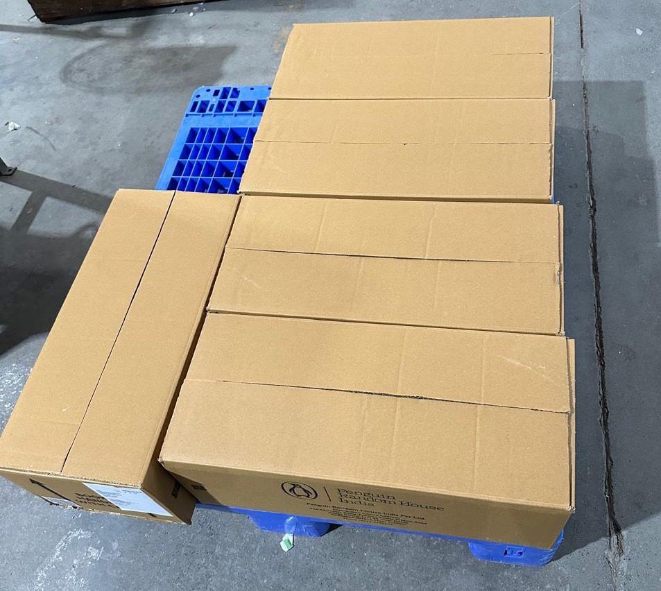 Eco-friendly sealed cartons representing Sustainability Goals in Packaging at Penguin Random House India